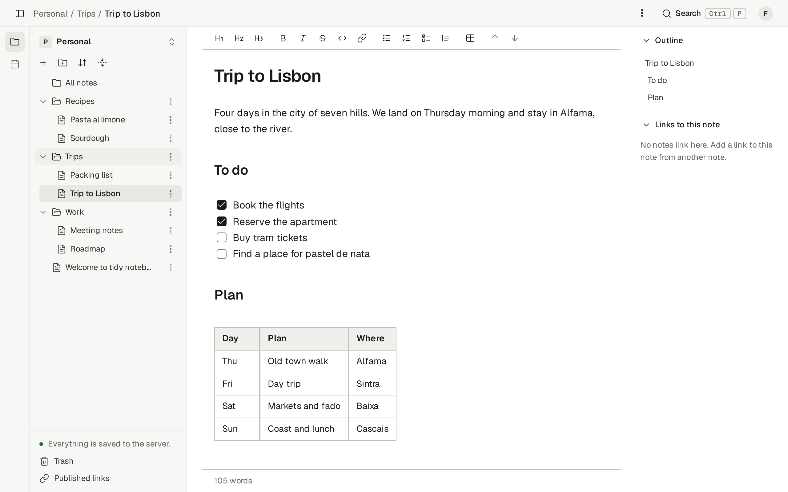 The note editor of tidy notebook, with folders and a note about a trip